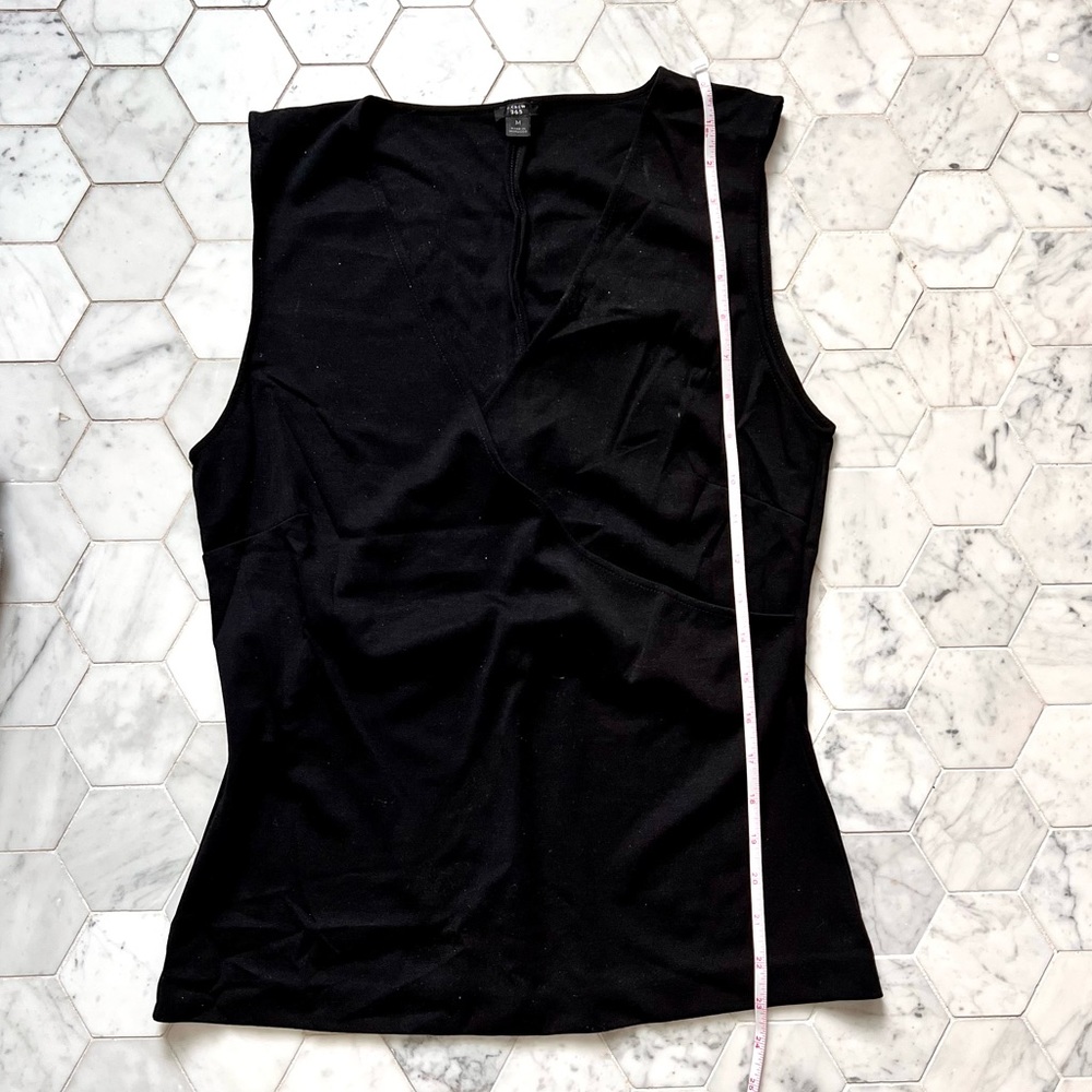 J Crew black knit top size medium. Great for vacation, work or running errands.